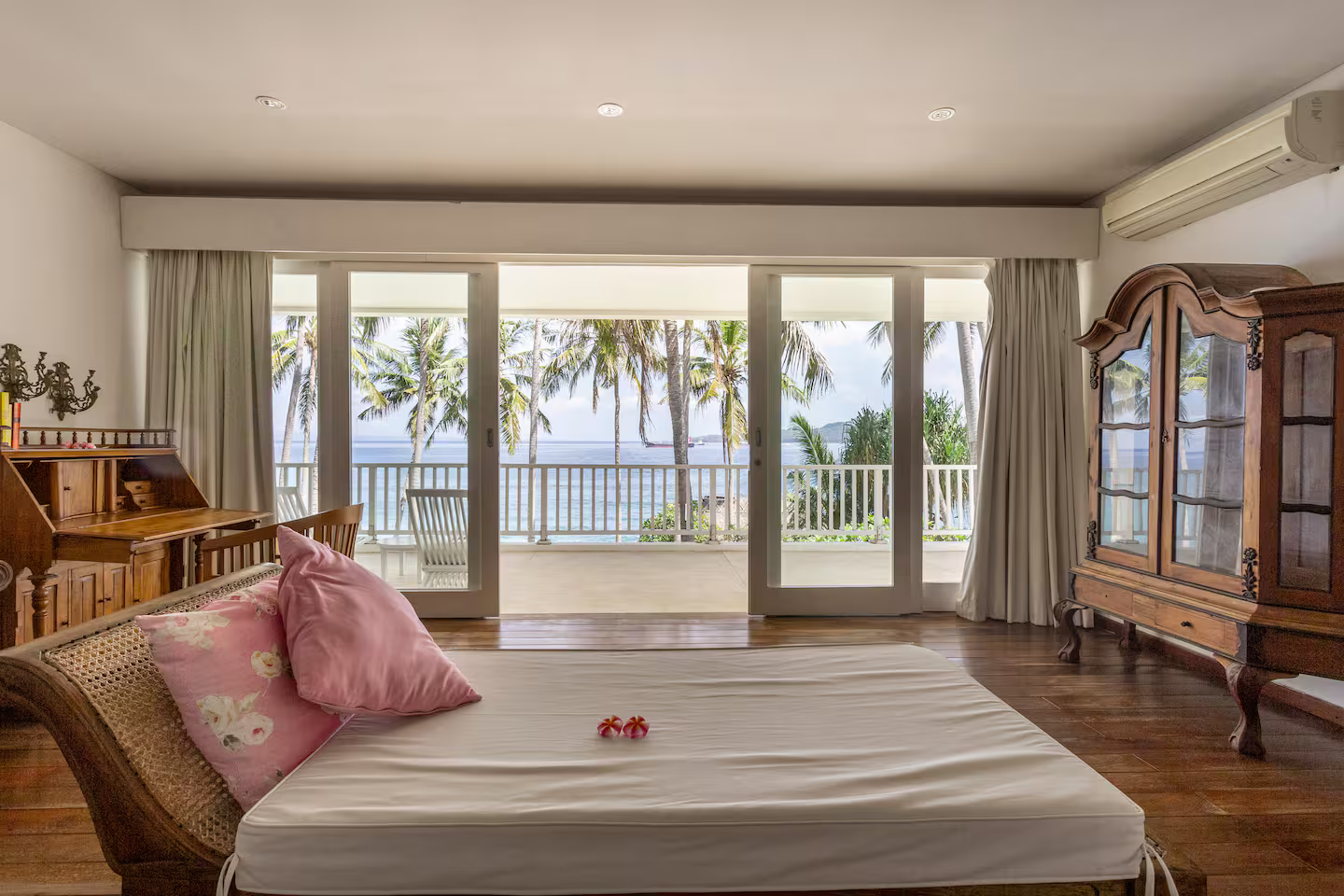Bedroom with French doors opening onto the garden