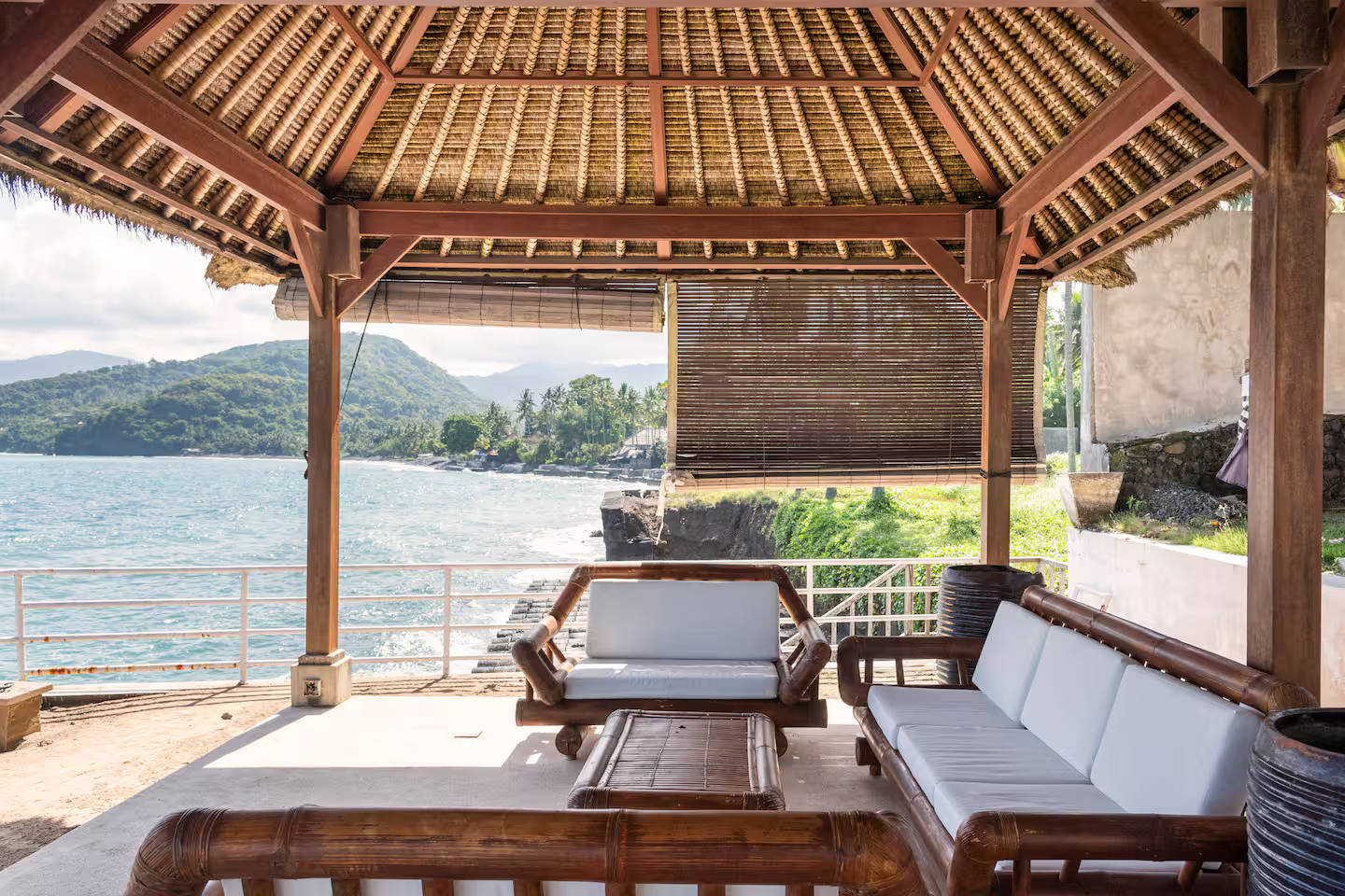 Seating in a beachfront pavilion overlooking the bay