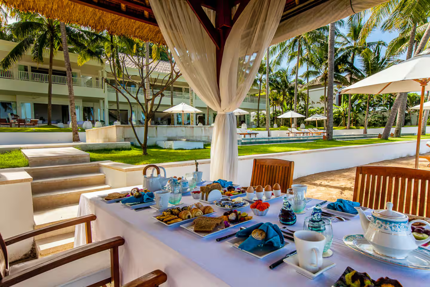 Breakfast served in an open-air garden pavilion